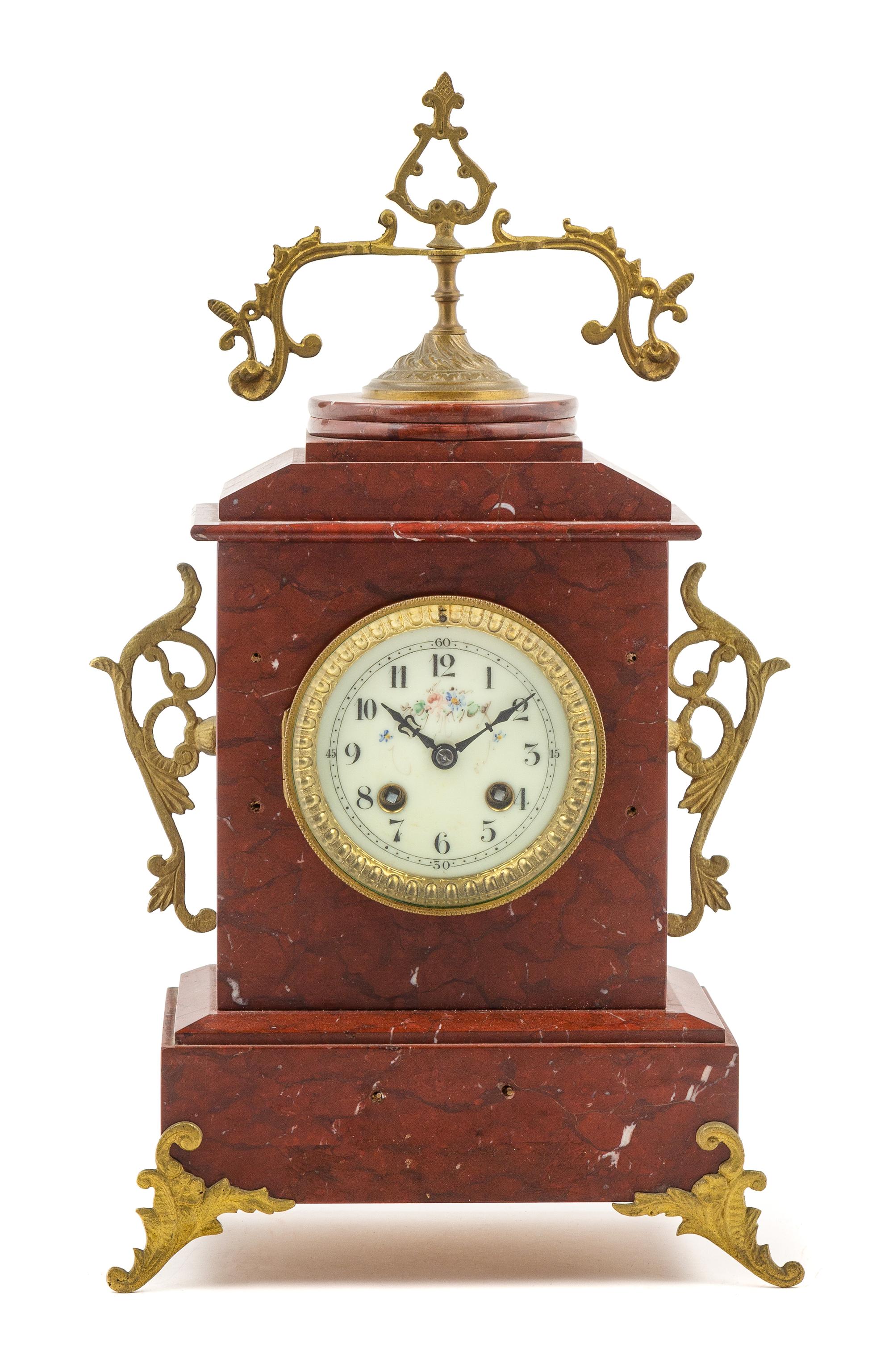 A French Gilt Metal Mounted Marble Mantel Clock