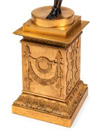 A Pair of Restauration Gilt and Patinated Bronze Figural Ten-Light Candelabra
