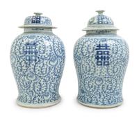 A Pair of Chinese Blue and White Porcelain Jars and Covers