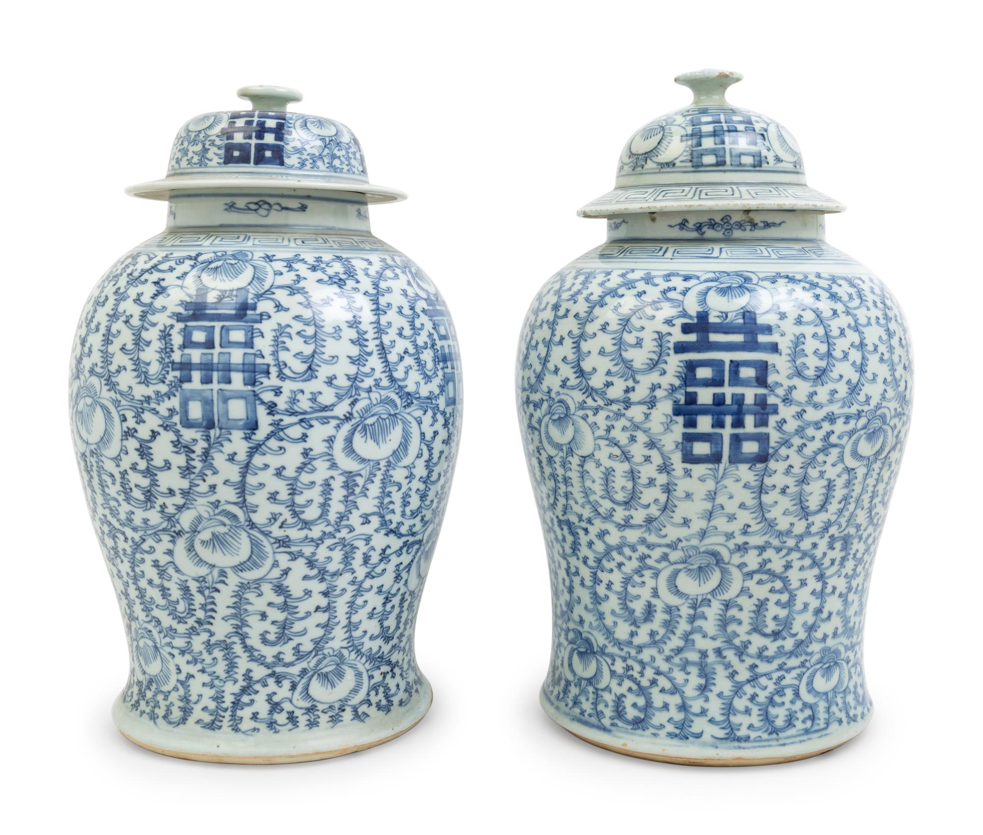 A Pair of Chinese Blue and White Porcelain Jars and Covers