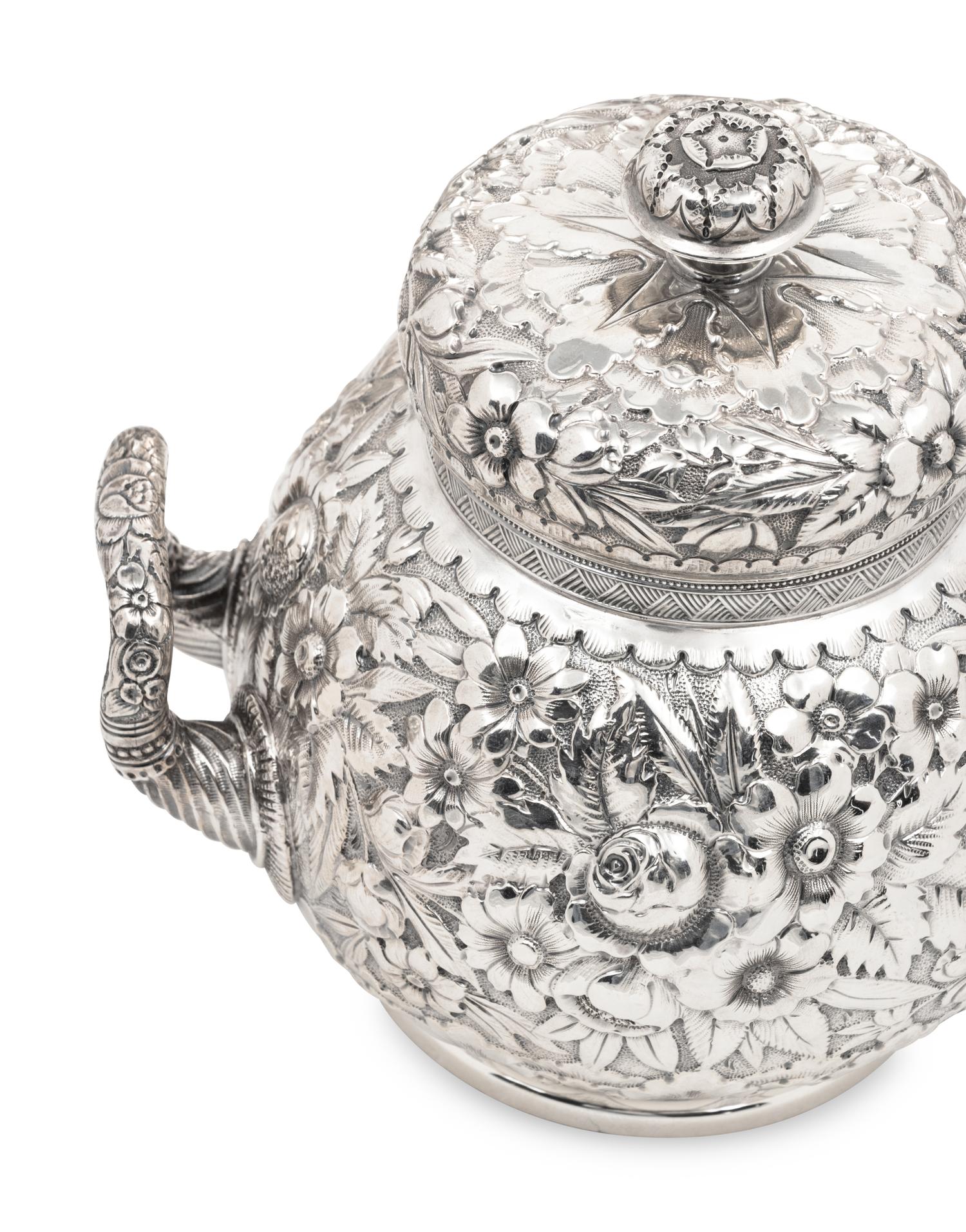 A Tiffany and Co. Silver Repoussé Five-Piece Tea and Coffee Service
