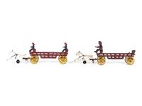 Three Painted Cast Iron Toy Horse Drawn Fire Wagons