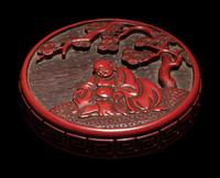 A Carved Cinnabar Lacquer 'Luohan' Circular Covered Box