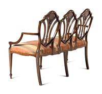 An Edwardian Painted Satinwood Triple-Back Settee and Armchair