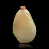 A Chinese Russet Jade Pebble-Form Snuff Bottle