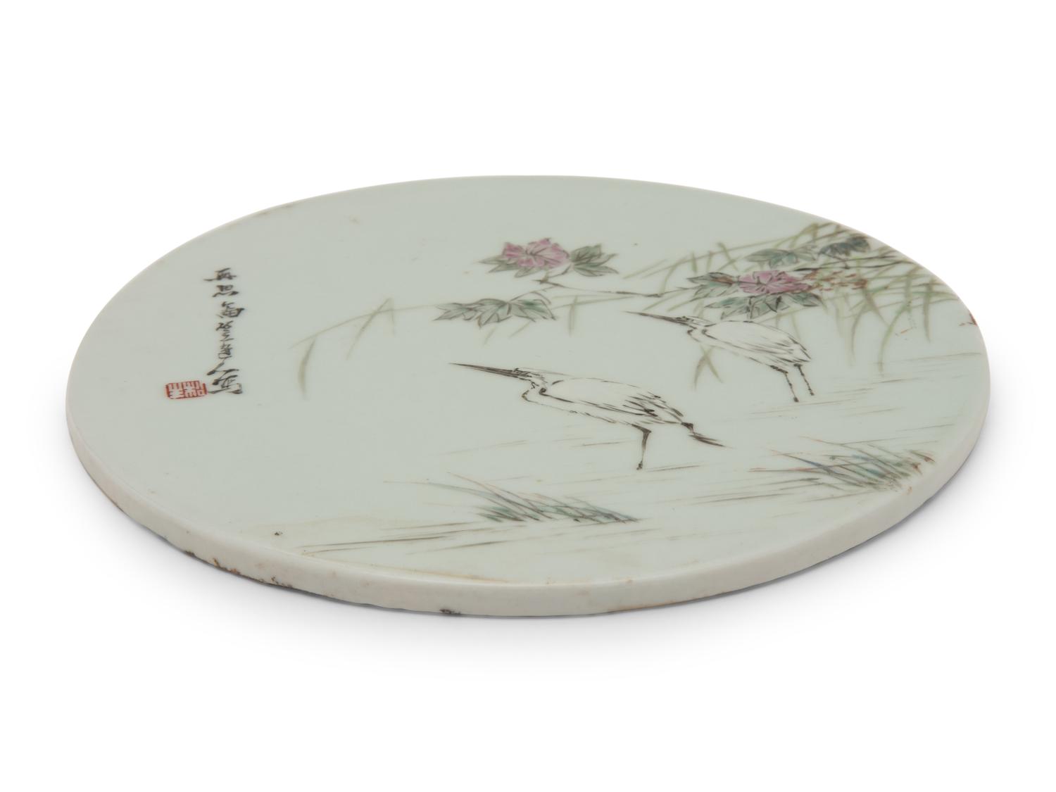 A Chinese Qianjiang Enameled Porcelain Circular Plaque
