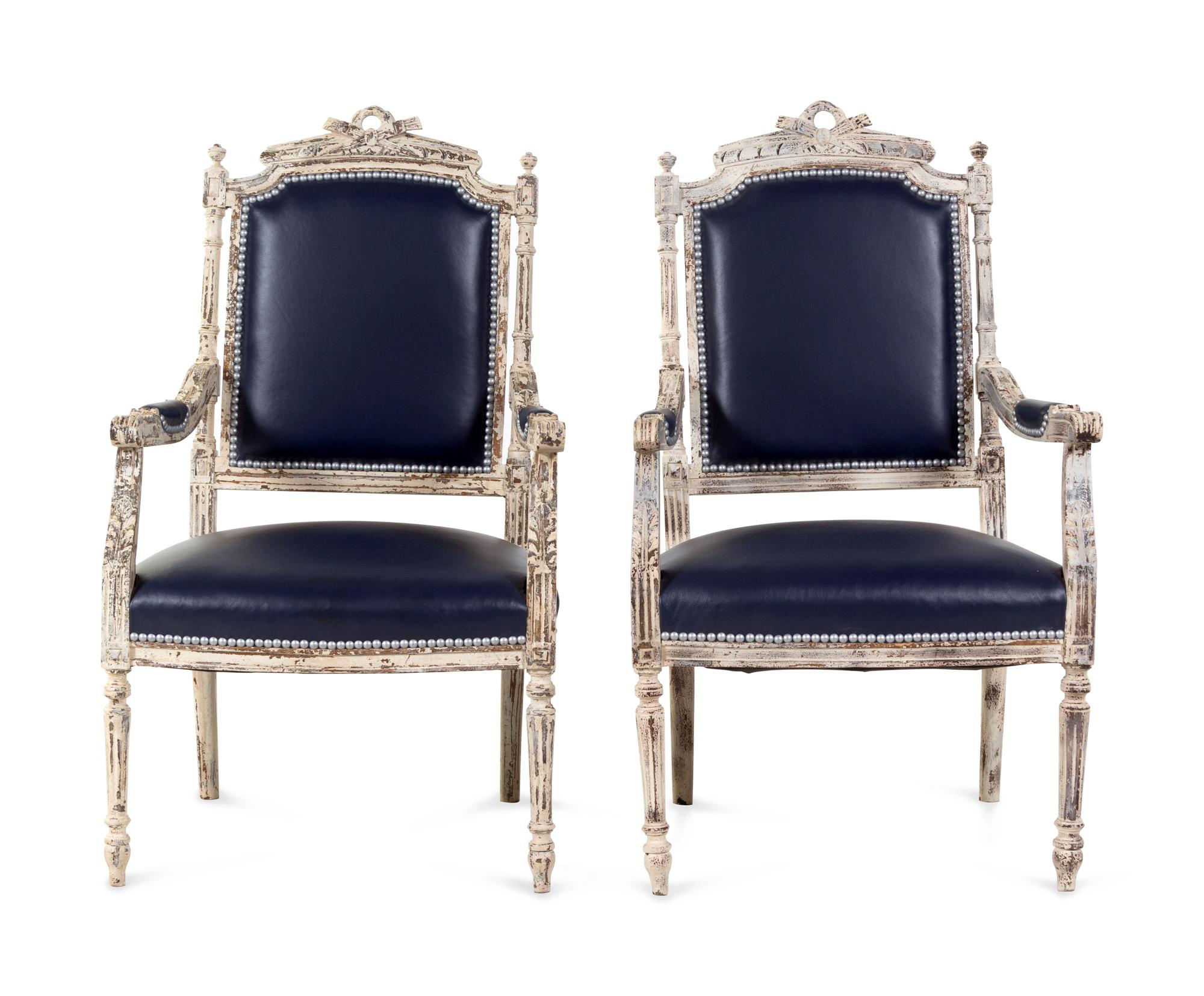 A Pair of Louis XVI Style Painted Fauteuils
