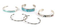 Five Southwestern Silver Bracelets Length of one 5 1/2 x opening 1 x width 3/8 inches