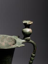 An Umayyad or Early Abbasid Bronze Ewer with a Pomegranate