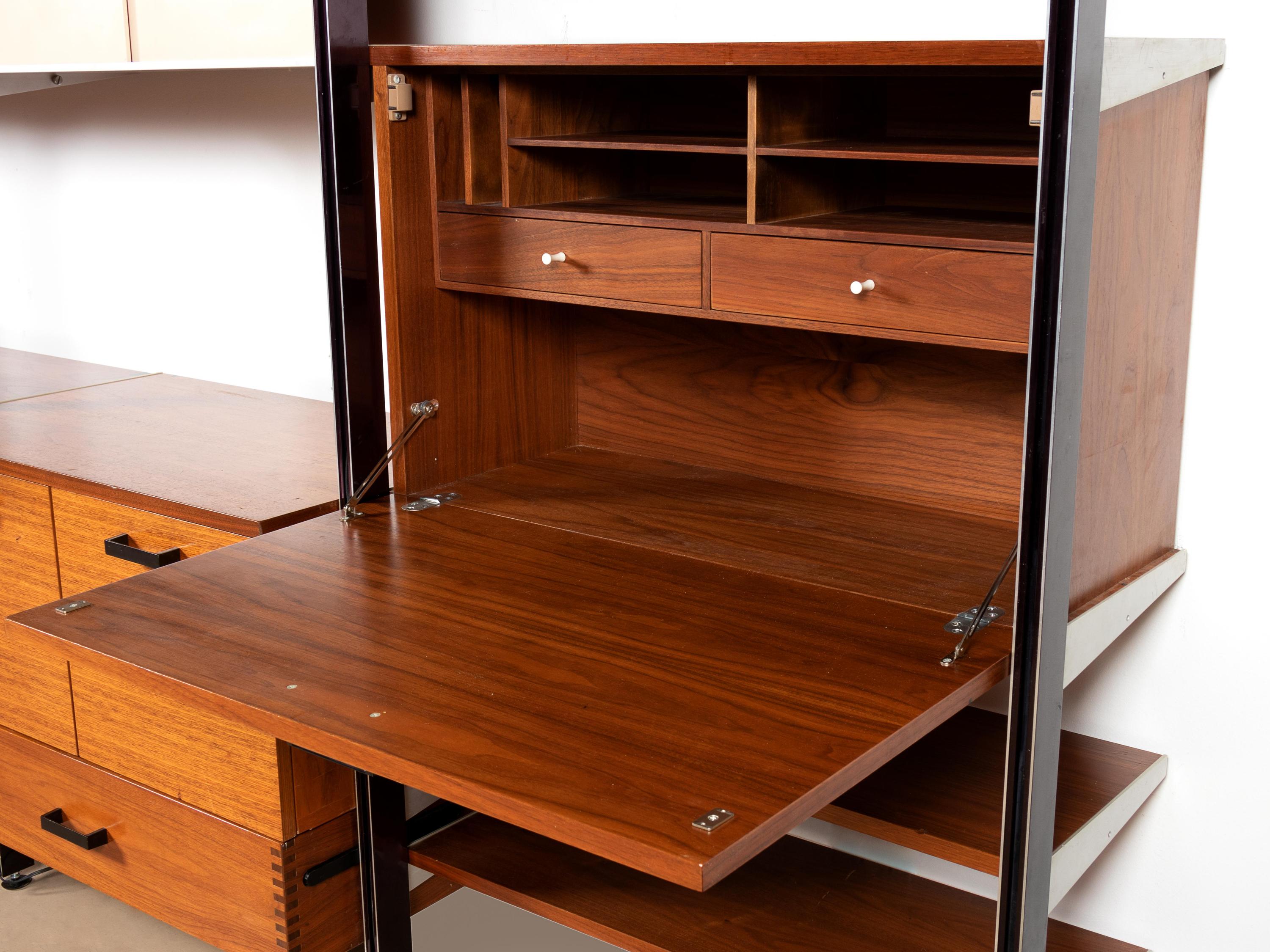 Comprehensive Storage System (CSS) Comprising 4 Upright Supports 6 Case Pieces 5 Shelves 2 Can Lights Herman Miller, USA