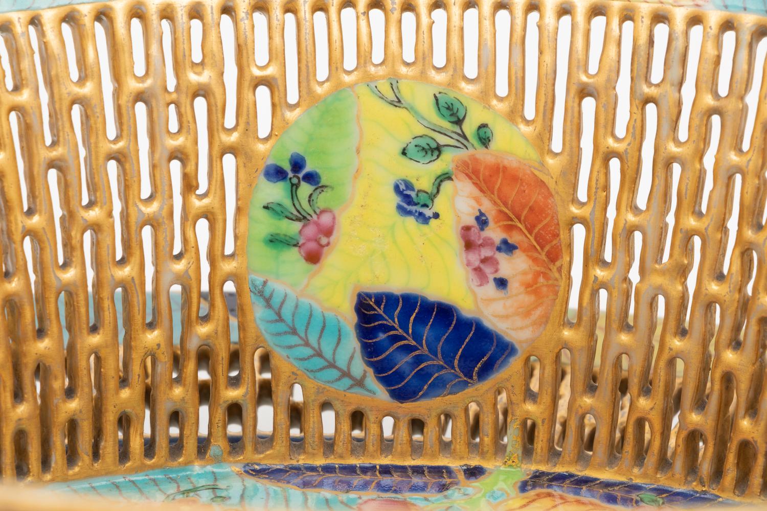 A Chinese Export Tobacco Leaf Reticulated Porcelain Basket and Underplate