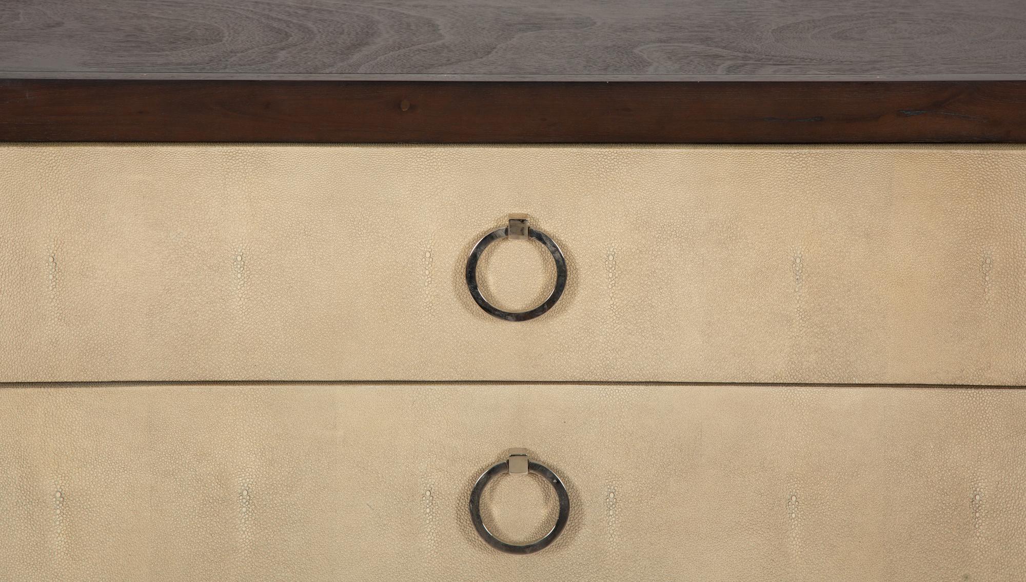A Pair of Faux Shagreen and Stained Oak Three-Drawer Commodes