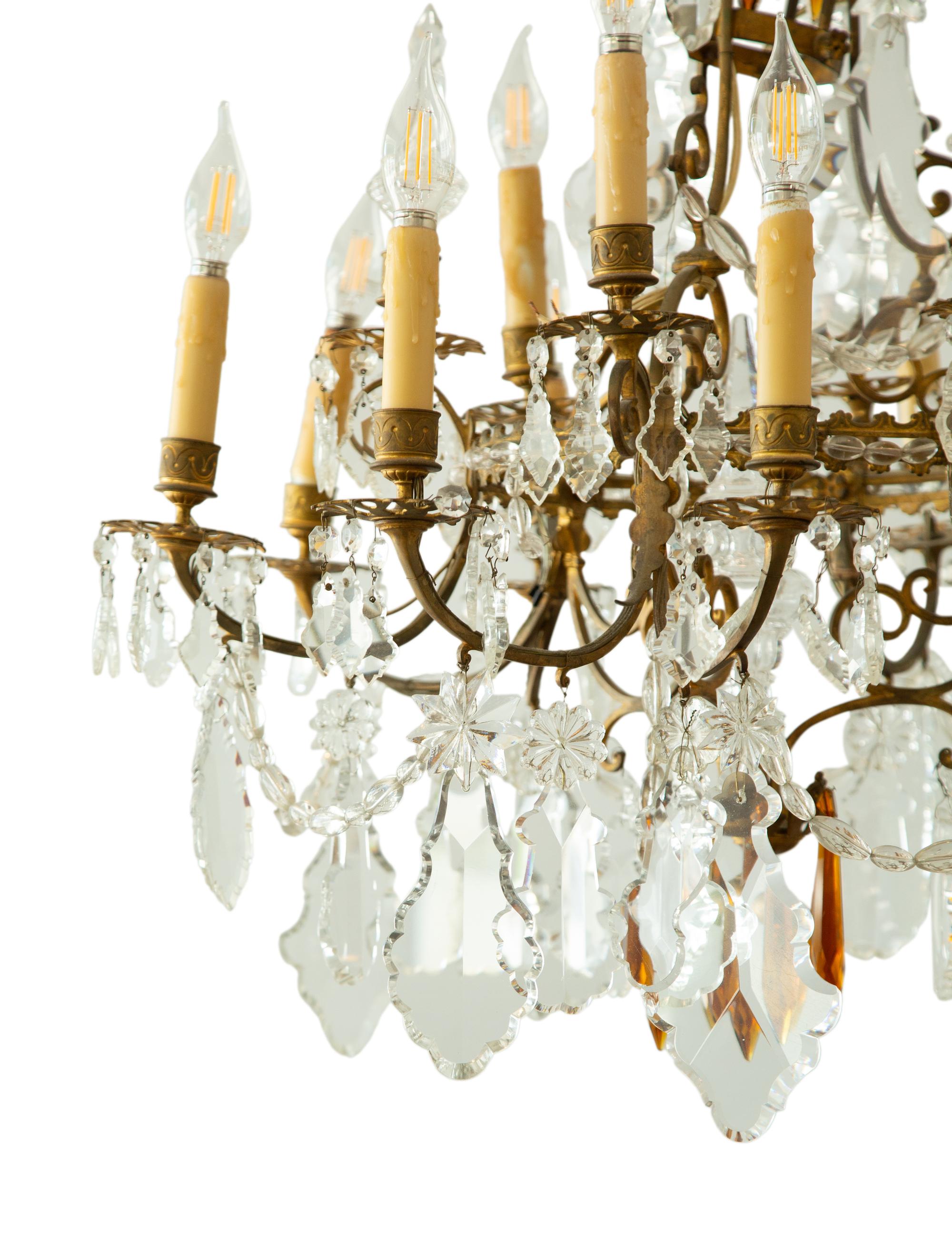 A Louis XV Style Gilt Bronze and Cut Glass Twelve-Light Chandelier