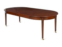 A Mahogany Dining Table and An Associated Set of Eight Mahogany Chairs