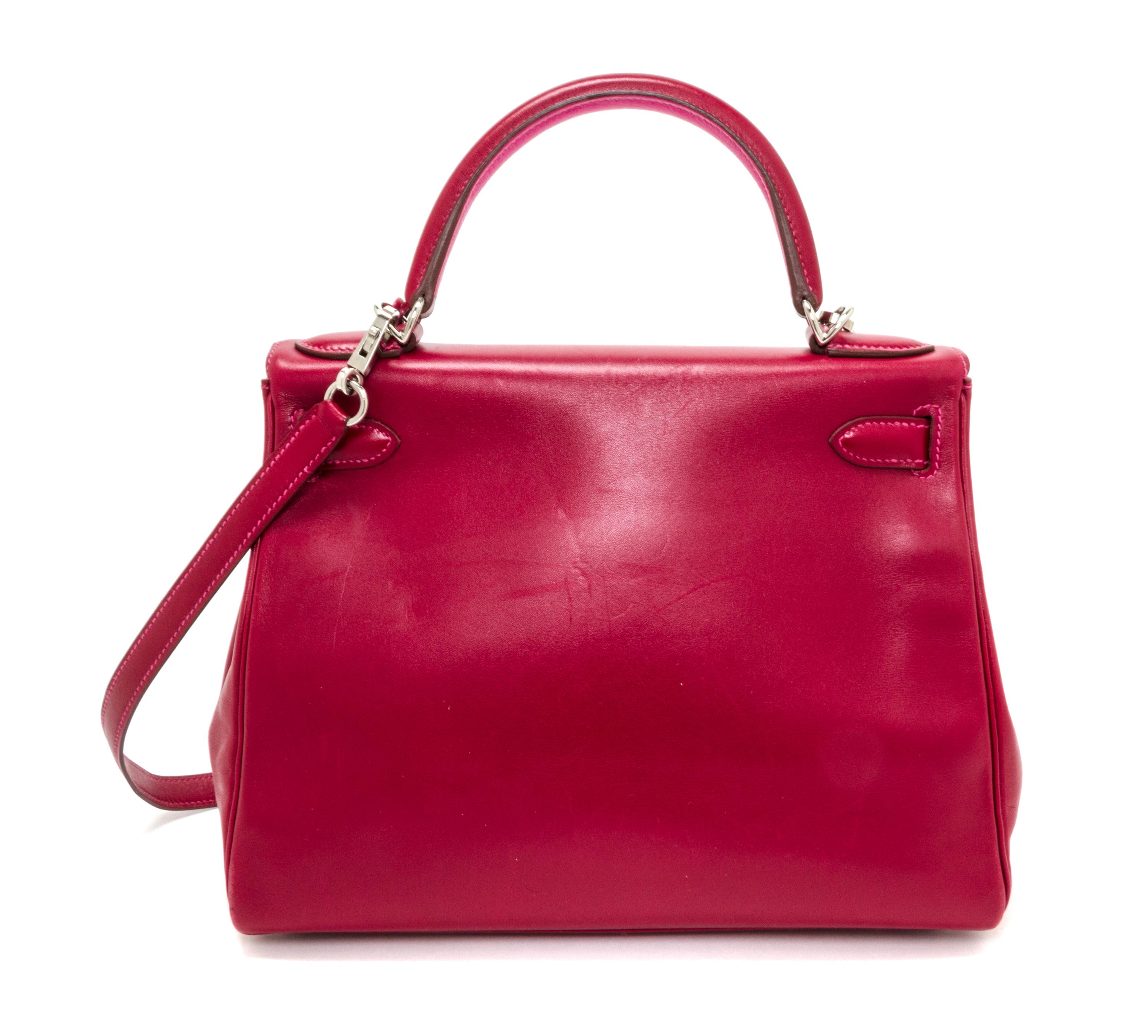 An Hermes Rubis and Rose Tyrien Candy Tadelakt and Chevre Retorne 28cm Kelly Handbag, 11" x 8.5" x 4".