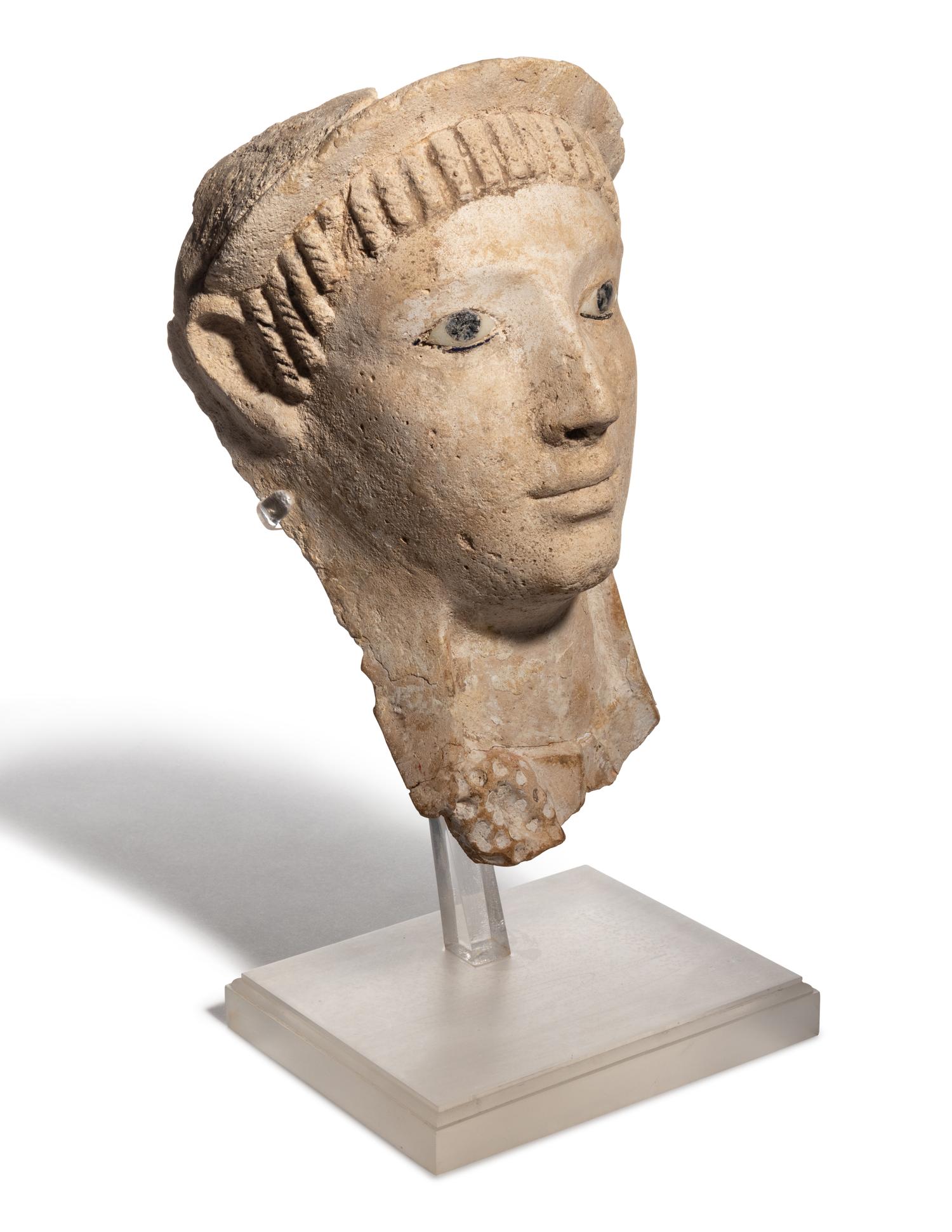 A Romano-Egyptian Stucco Mummy Mask with Glass Eyes