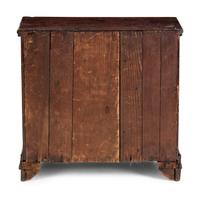 A Diminutive Walnut Chest of Drawers