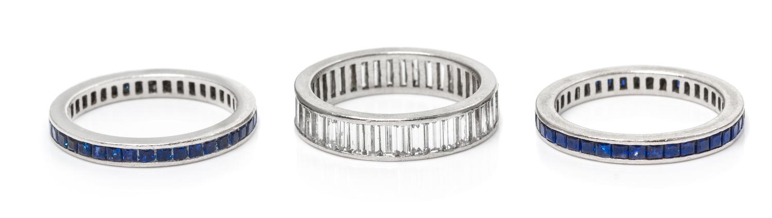 A Collection of Platinum and Gem Eternity Bands, 7.60 dwts.