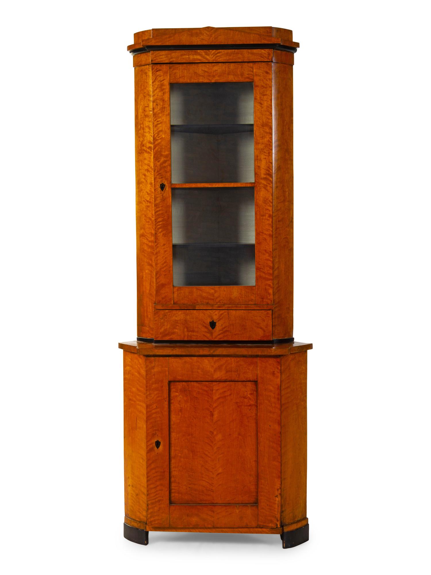 A Biedermeier Birch Corner Cabinet