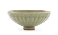 A Longquan Celadon Glazed Lotus-Form Bowl Diameter 6 3/4 inches.