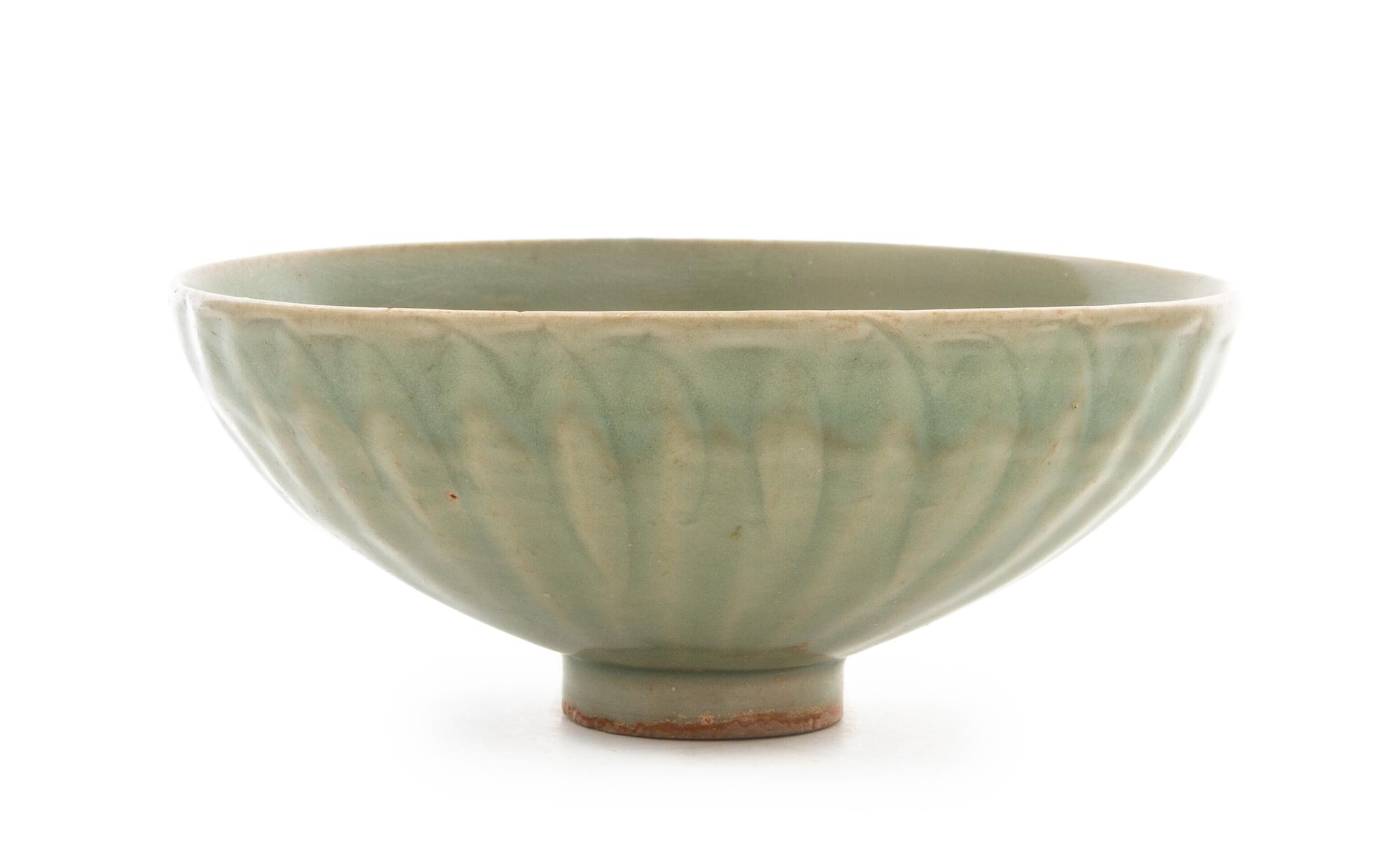 A Longquan Celadon Glazed Lotus-Form Bowl Diameter 6 3/4 inches.