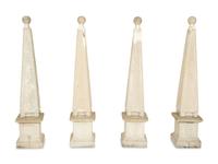 A Set of Four Cast Stone Obelisks