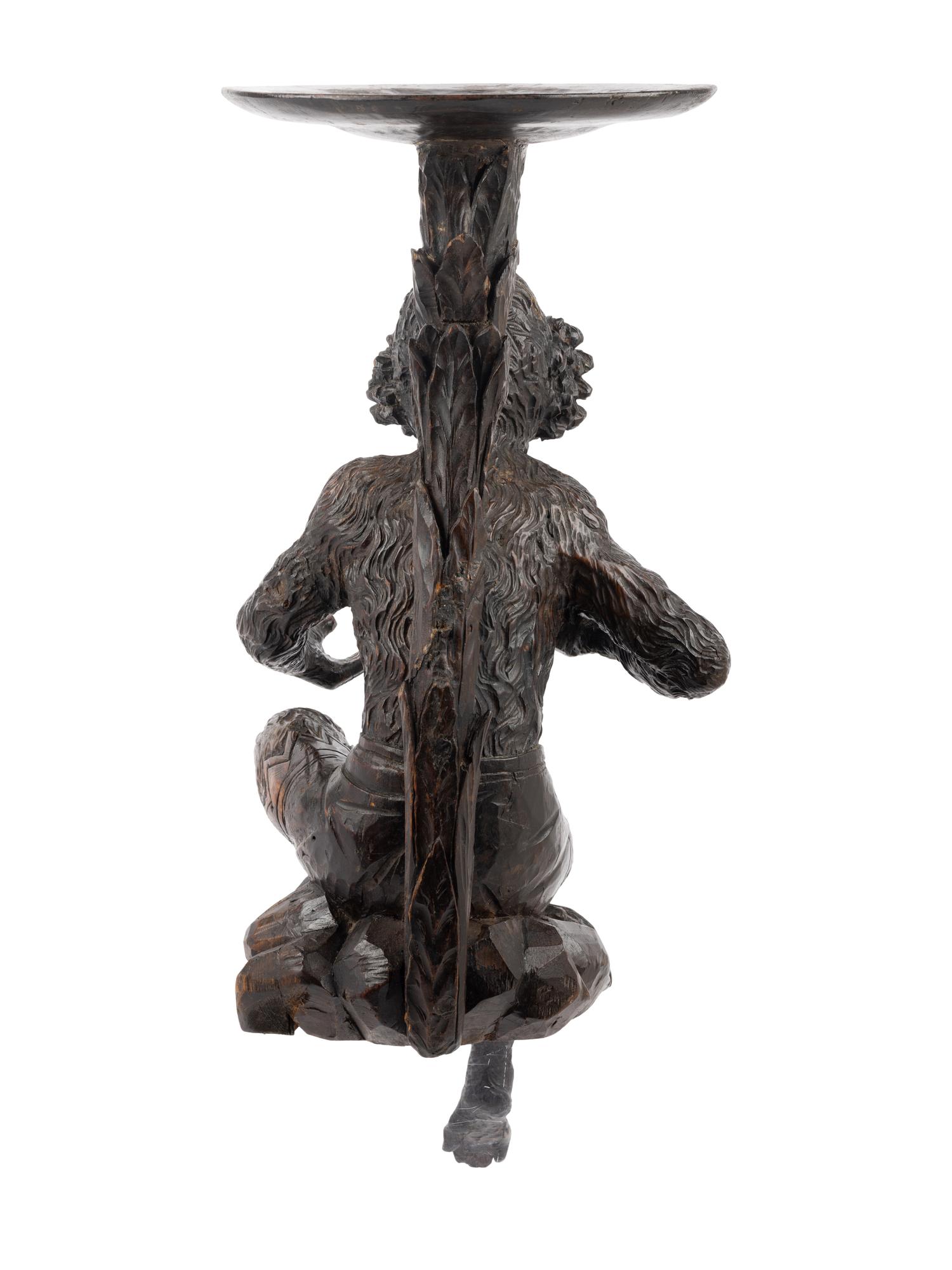A Venetian Style Carved Walnut Figural Pedestal