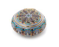 A Russian Silver and Enamel Snuff Box, Mark of Antip Kuzmichev, Moscow, early 20th century, or circular form, the case having a matted