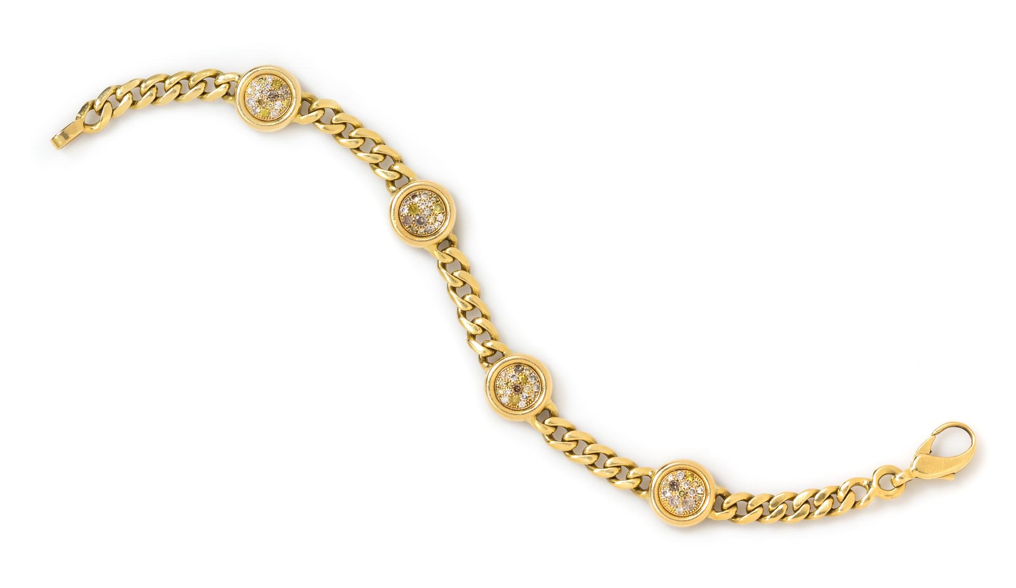 An 18 Karat Yellow Gold and Multicolor Diamond Bracelet,