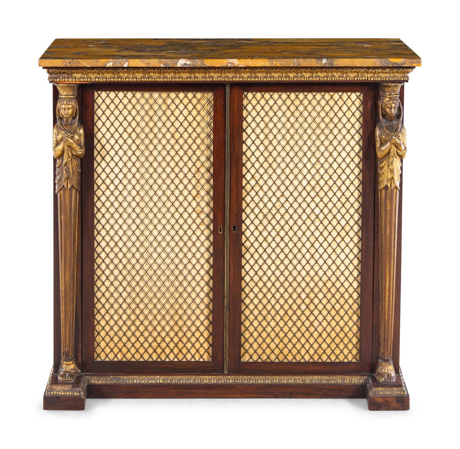 A Regency Egyptian Revival Style Parcel Gilt Rosewood Cabinet