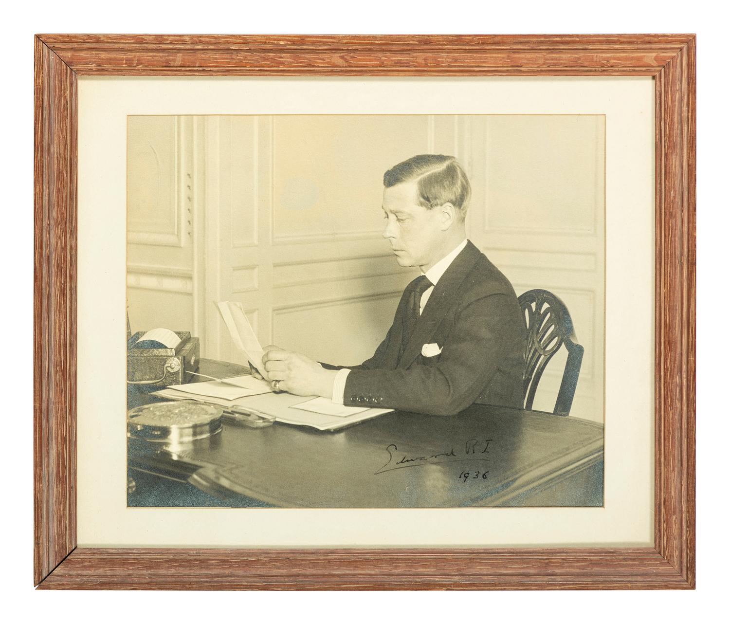 [ROYALTY]. WINDSOR, Edward, Duke of (1894-1972, "Edward VIII, King of England"). Photograph taken during 1936 radio broadcast when he announced abdicating as King of Great Britain, later SIGNED ("Edward R.I.") in 1948.