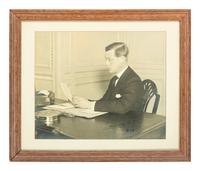 [ROYALTY]. WINDSOR, Edward, Duke of (1894-1972, "Edward VIII, King of England"). Photograph taken during 1936 radio broadcast when he announced abdicating as King of Great Britain, later SIGNED ("Edward R.I.") in 1948.