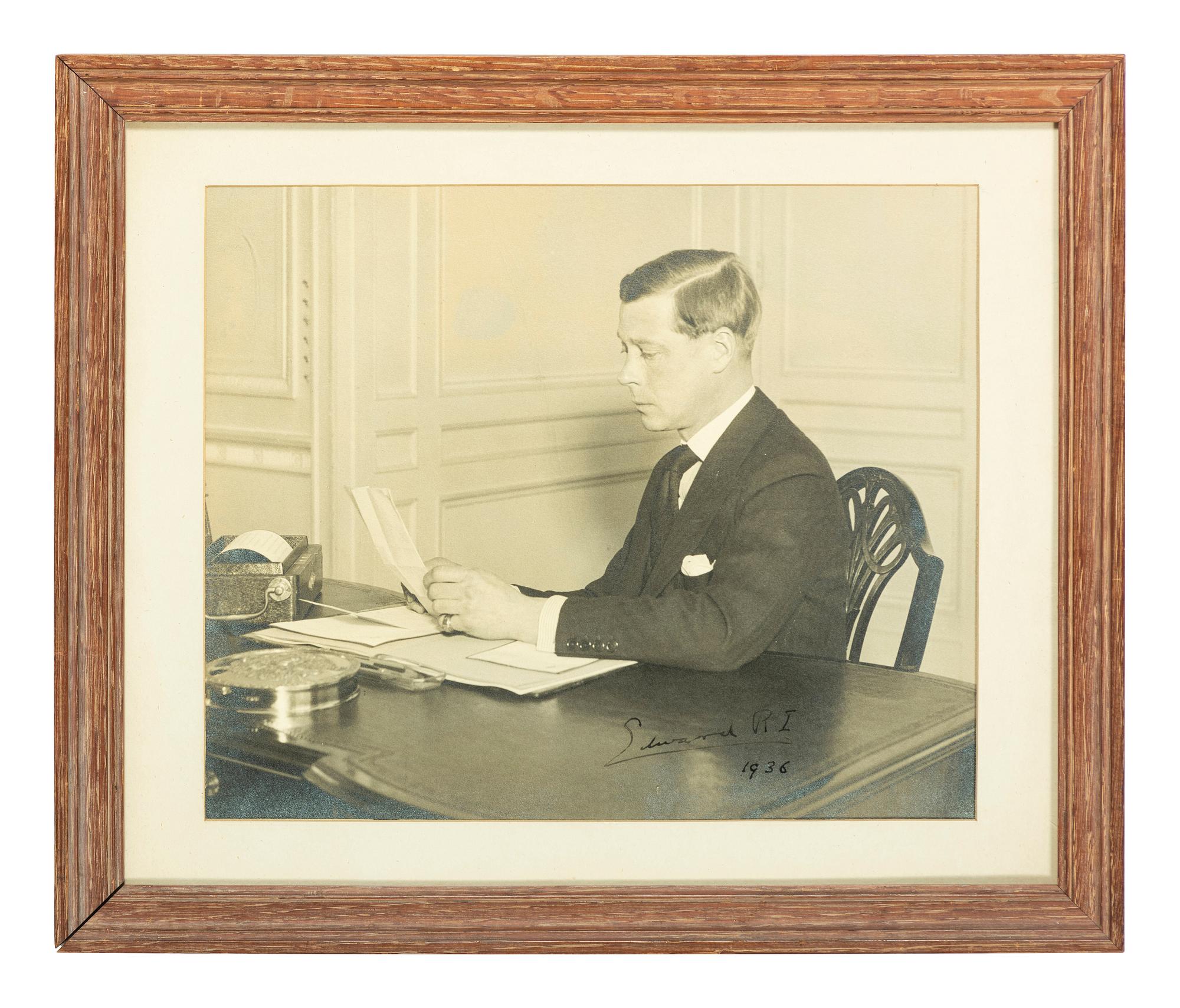 [ROYALTY]. WINDSOR, Edward, Duke of (1894-1972, "Edward VIII, King of England"). Photograph taken during 1936 radio broadcast when he announced abdicating as King of Great Britain, later SIGNED ("Edward R.I.") in 1948.