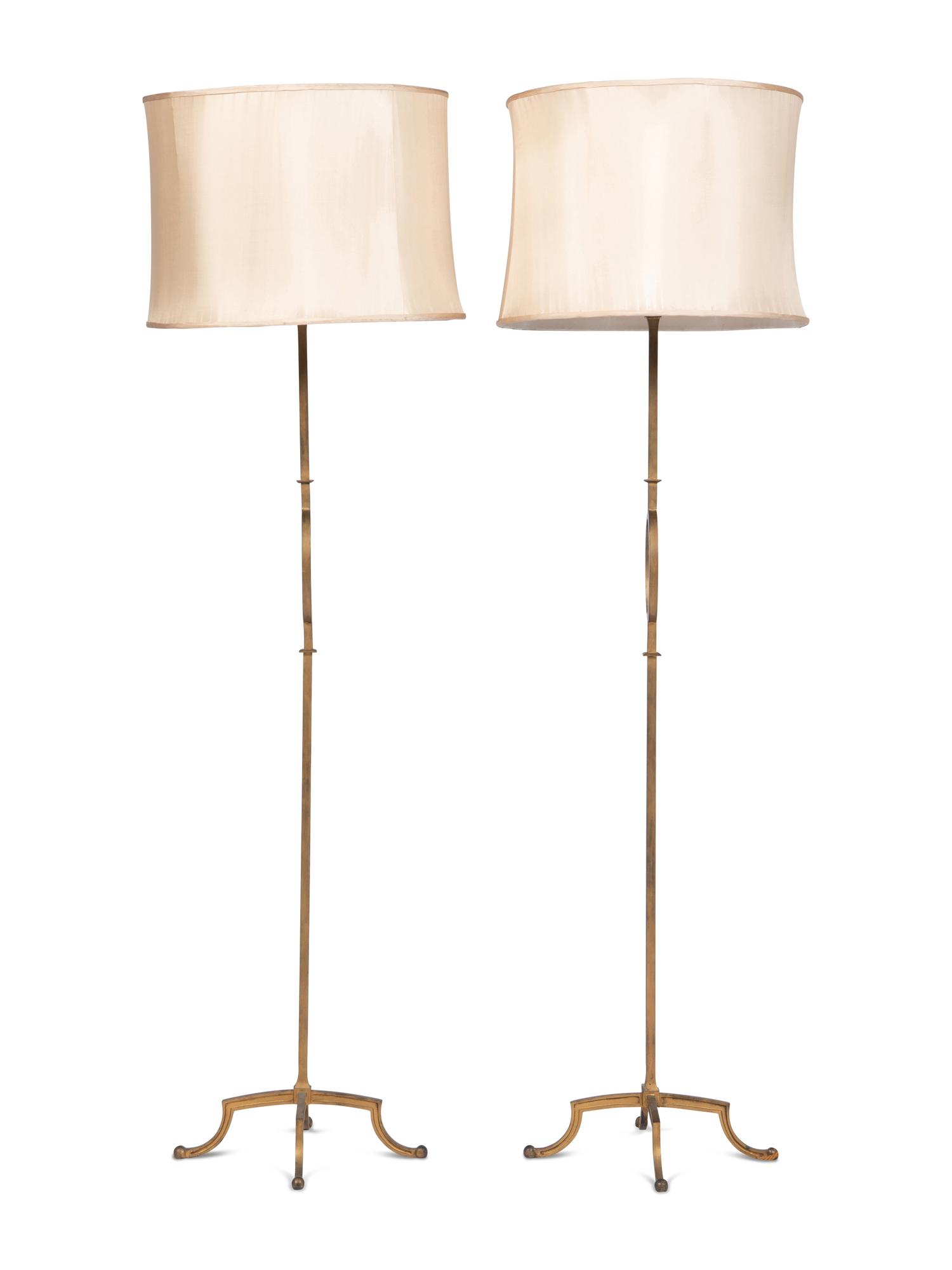 A Pair of Gilt Metal Standing Lamps