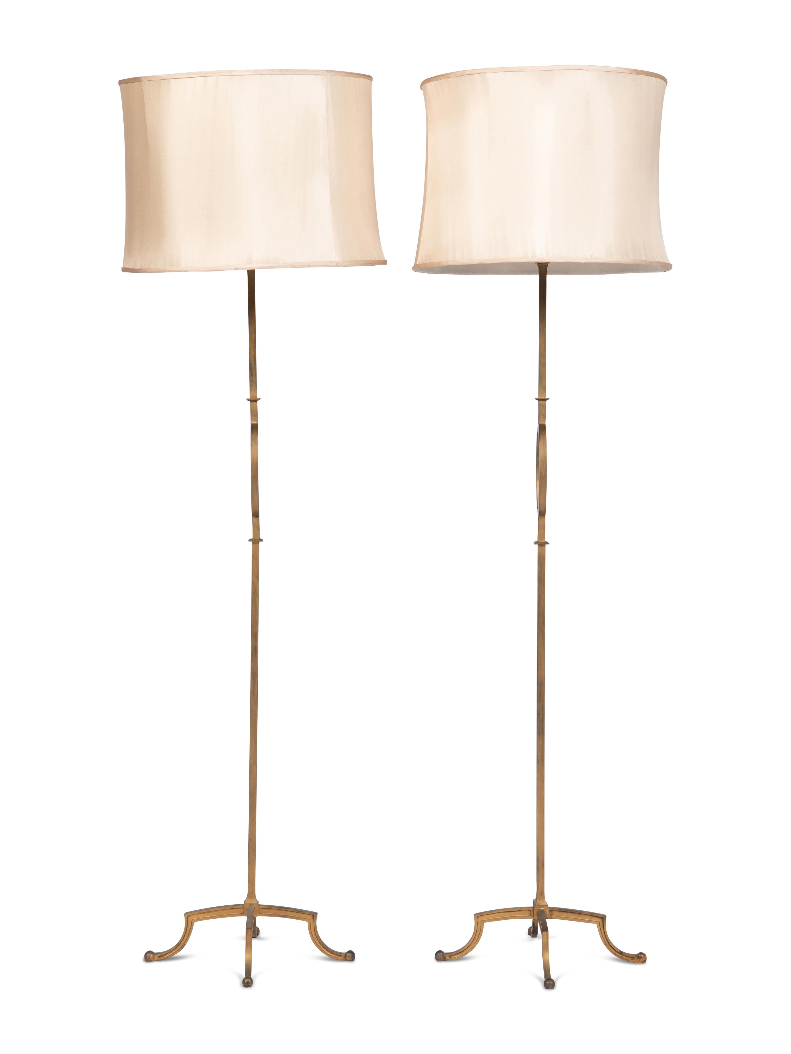 A Pair of Gilt Metal Standing Lamps