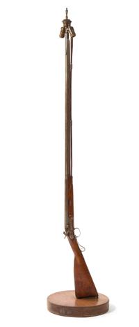 An American Percussion Cap Rifle Height overall 65 inches.