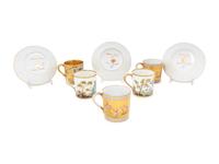 A Group of French Painted Porcelain Coffee Cups and Saucers