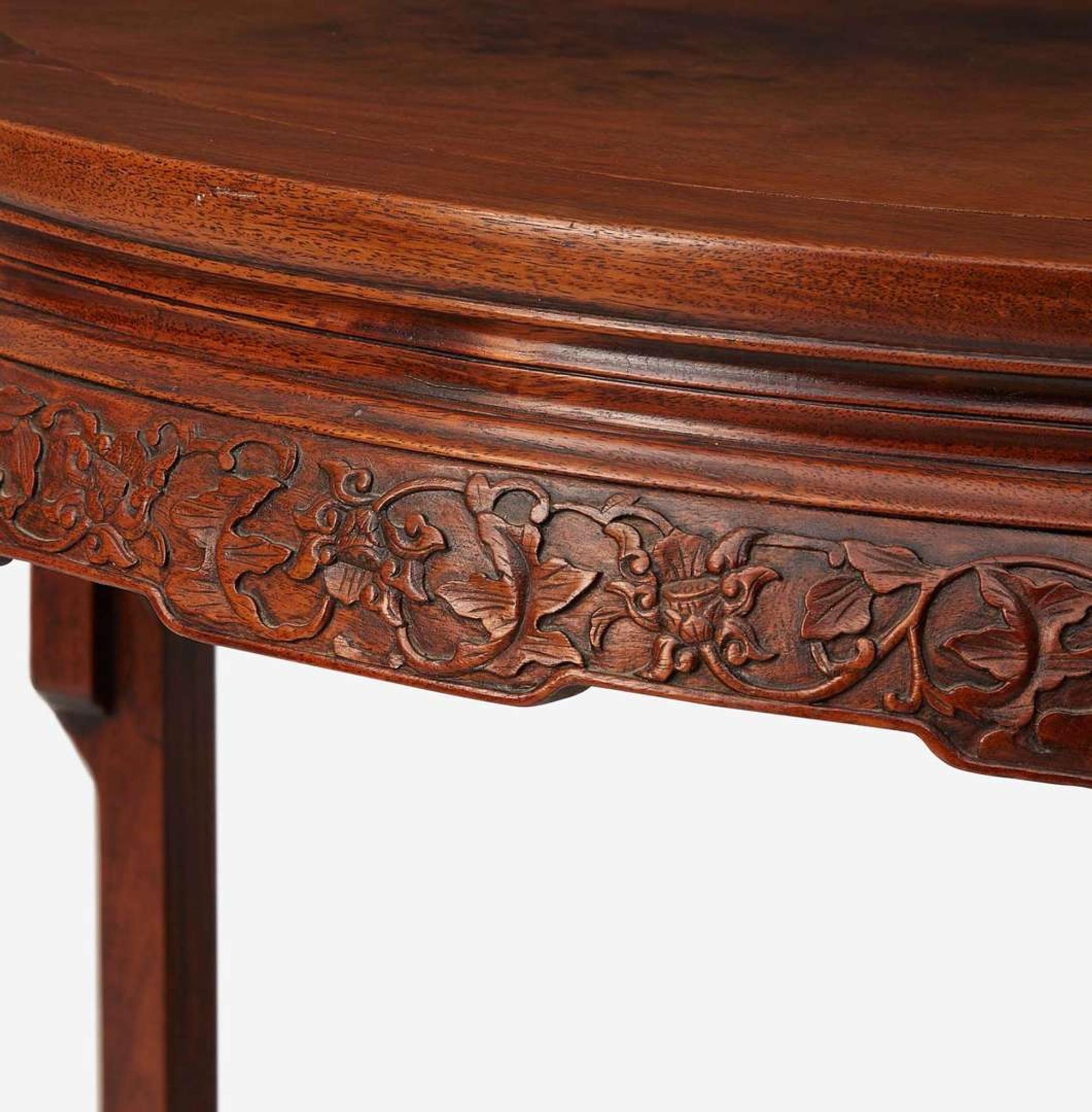 A Chinese carved hardwood demilune table 硬木月牙桌
