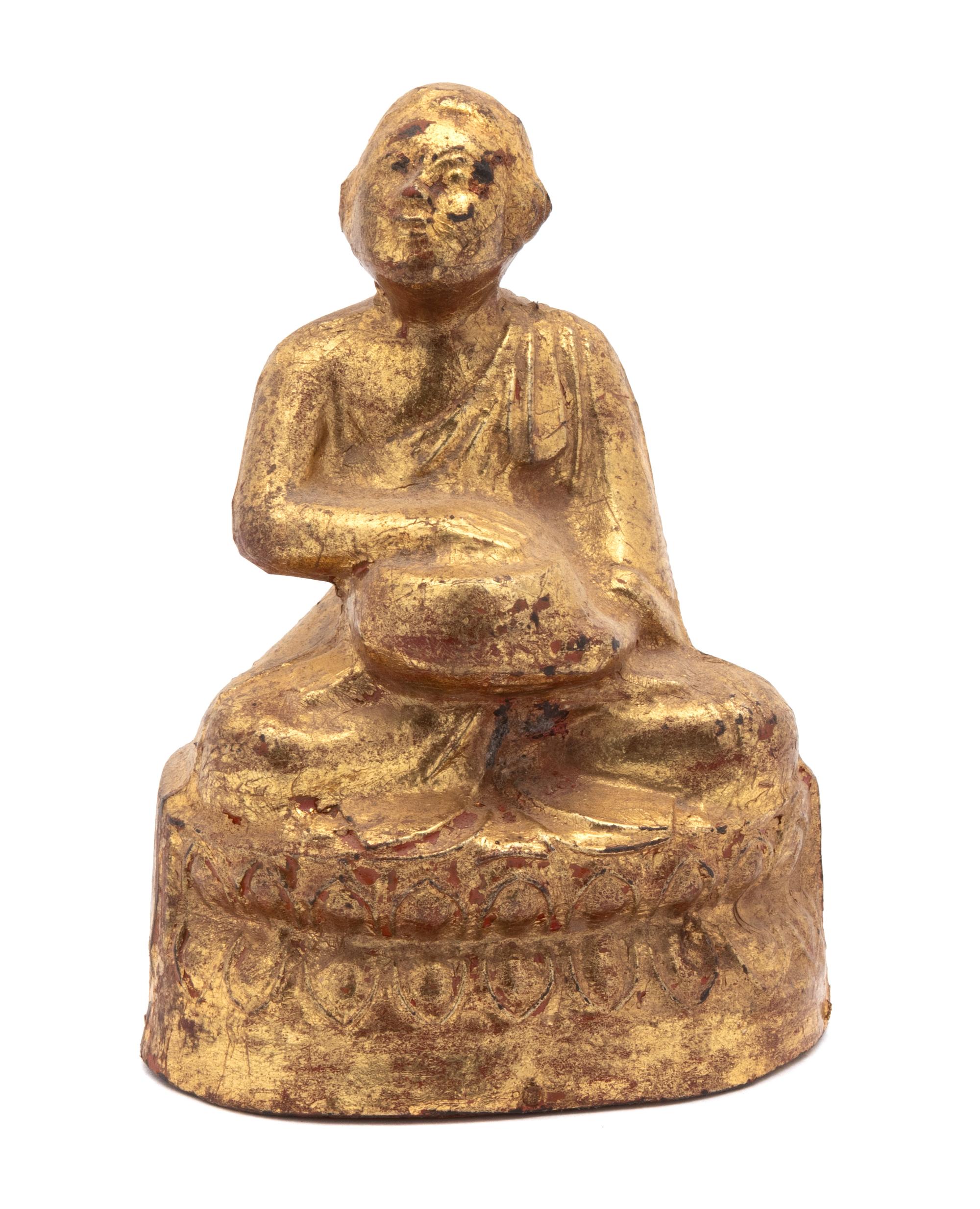 A Thai Gilt Lacquered Wood Figure of Buddha Height 5 1/4 inches. — EARLY 20TH CENTURY
