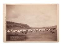 [LATE INDIAN WARS]. GRABILL, John C.H. (1849-1903), photographer. "In Camp." The 7th US Cavalry in camp at Fort Meade, Dak., under marching orders to Ft. Riley . Deadwood & Sturgis, Dakota Territory, 1888.
