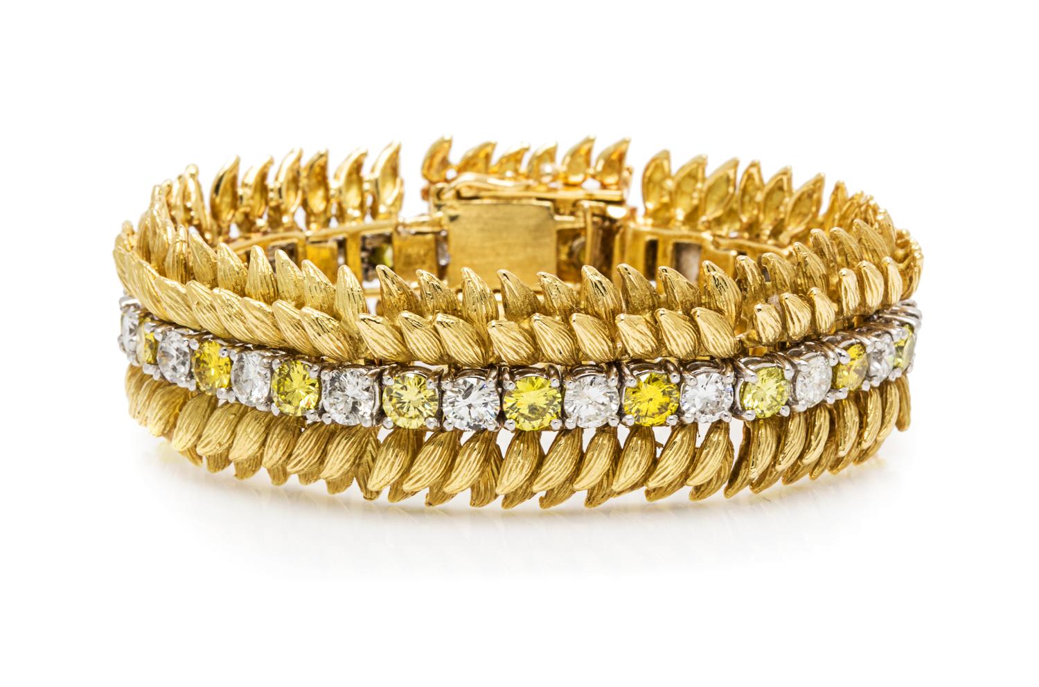 An 18 Karat Yellow Gold, Platinum, Colored Diamond and Diamond Bracelet, 57.50 dwts.
