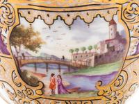 Three Meissen Painted and Parcel Gilt Porcelain Cup and Saucer Sets, a Covered Cup and Two Spoons