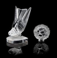 Lalique, a group of two molded and frosted glass figures, comprising a Hirondelles bird motif bookend and a Pax figural ornament