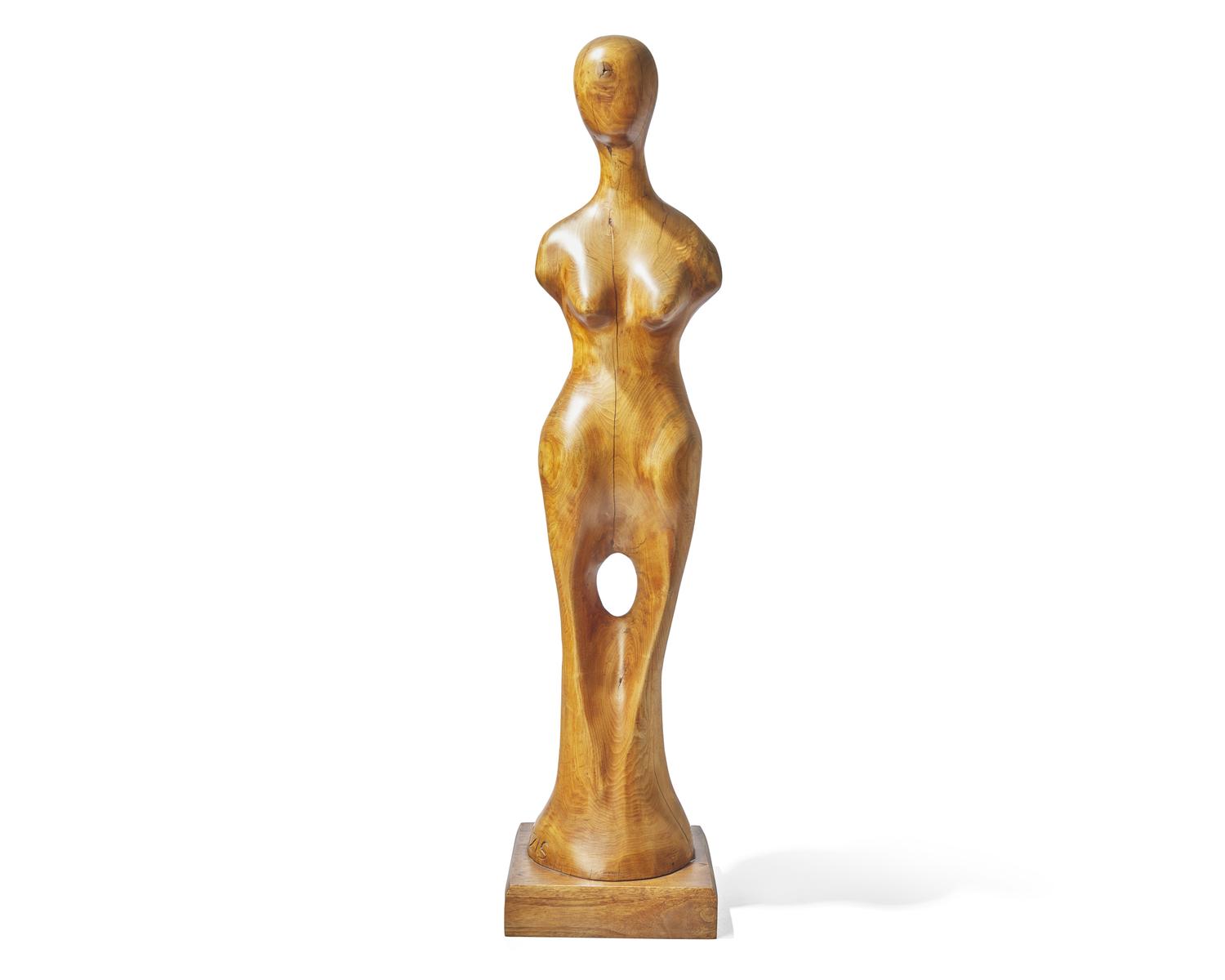 Tom Bazis (b. 1943), A wood carving of a female figure