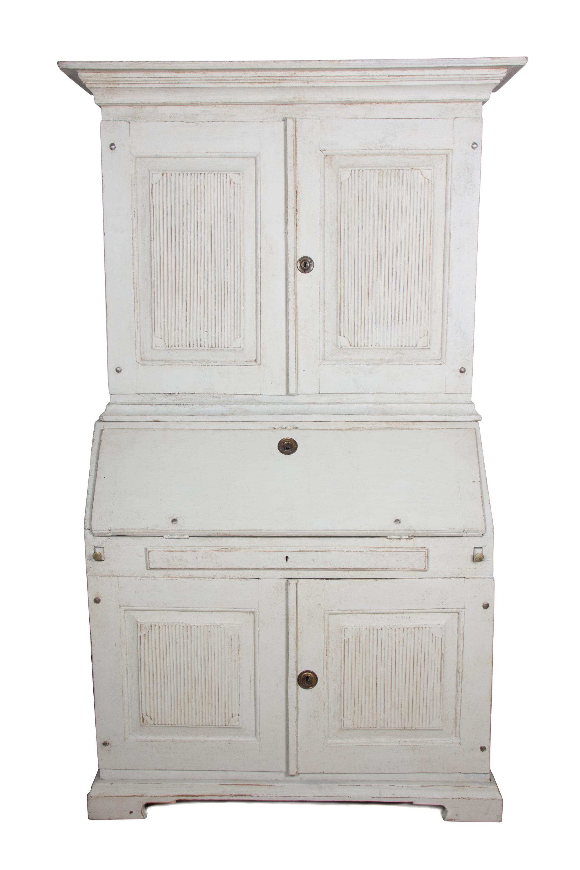 A Swedish White-Painted Secretary Bookcase Height 74 1/2 x width 44 1/4 x depth 21 1/4 inches. — LATE 19TH/EARLY 20TH CENTURY