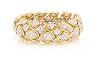 A Vintage 18 Karat Two Tone Gold and Diamond Bracelet, 84.50 dwts.