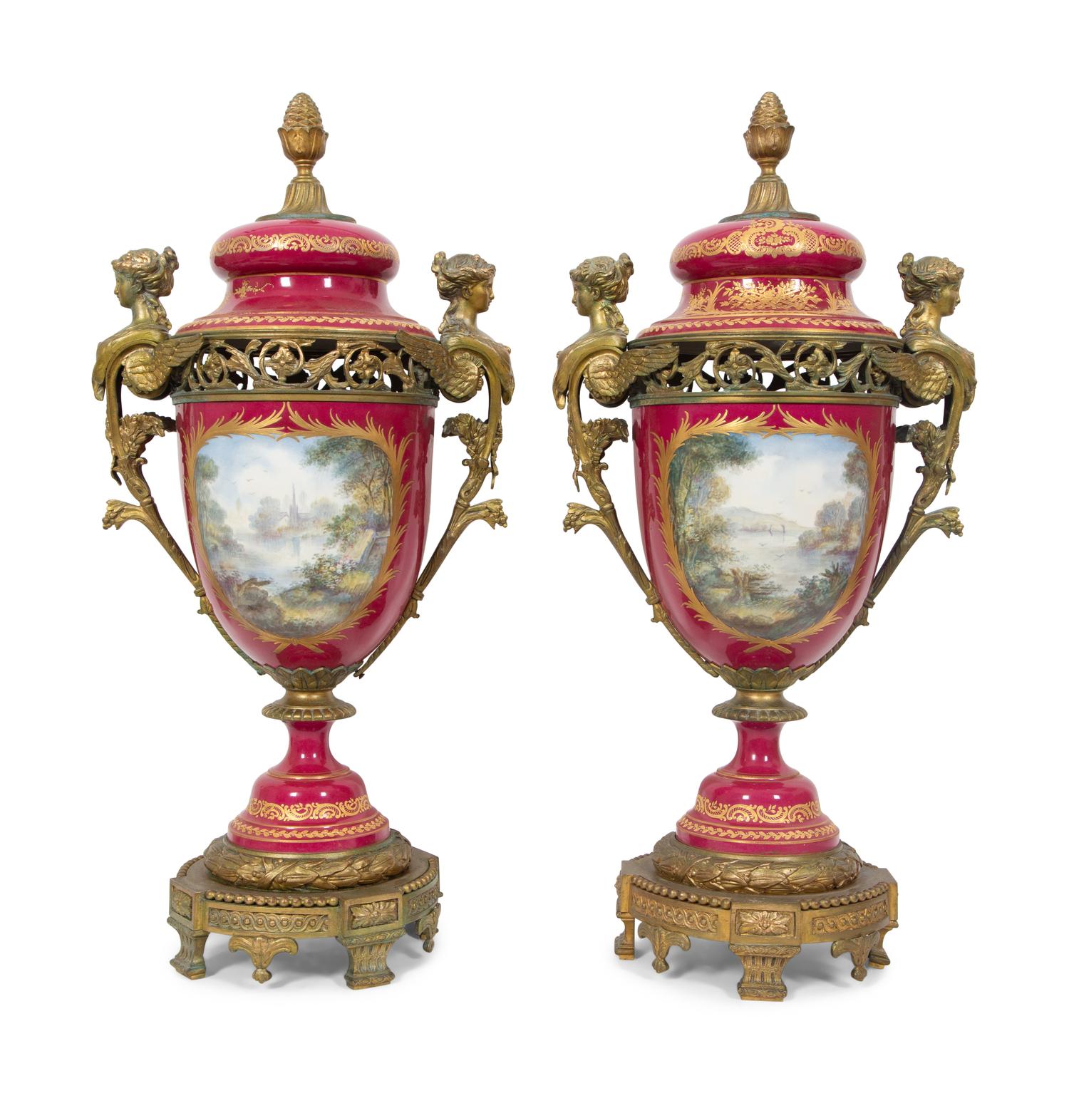 A Pair of Gilt Bronze Mounted Sevres Style Porcelain Covered Urns