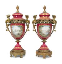 A Pair of Gilt Bronze Mounted Sevres Style Porcelain Covered Urns