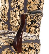 A Set of Four Upholstered Armchairs