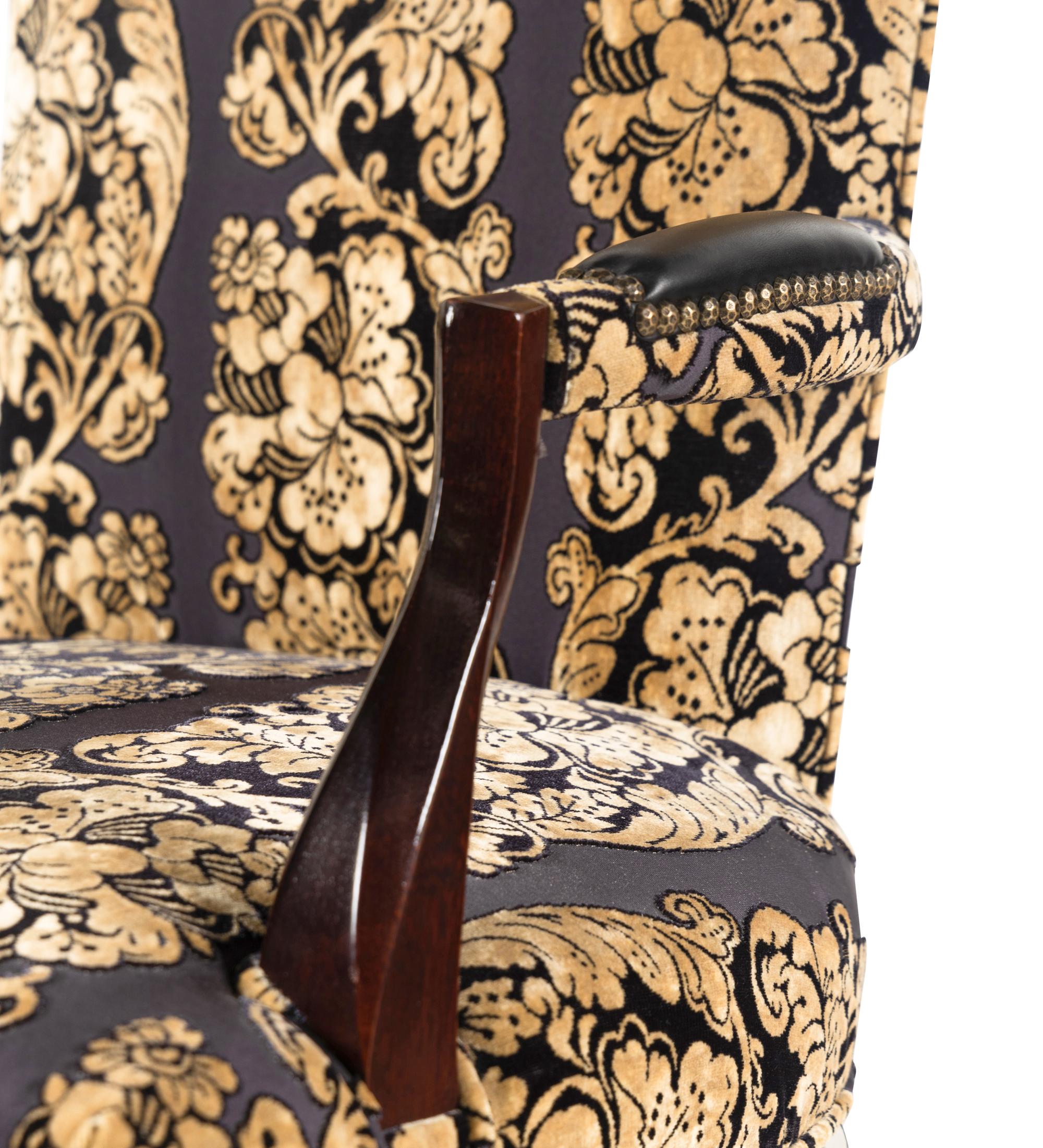 A Set of Four Upholstered Armchairs